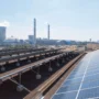 solar panels next to factory 1 90x90